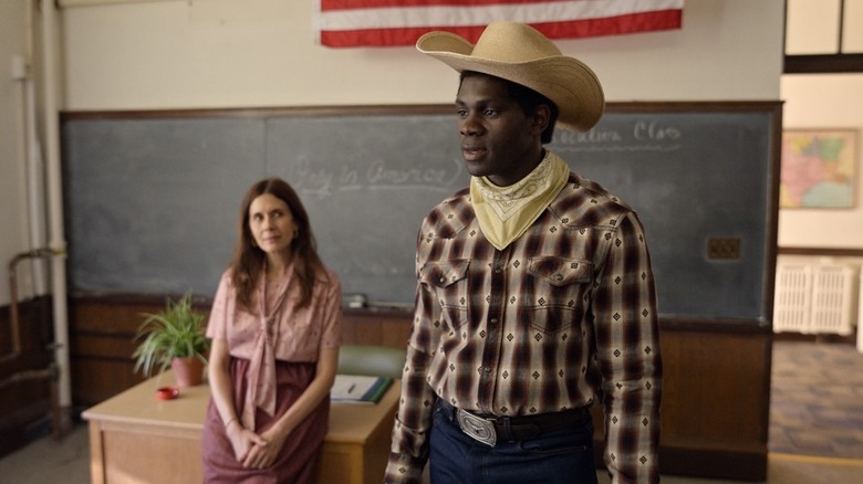 Iwegbuna (Conphidance) wearing a cowboy hat on Little America
