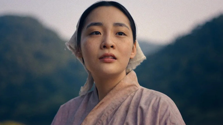 Kim Sunja (Kim Min-ha) amid the mountains on Pachinko