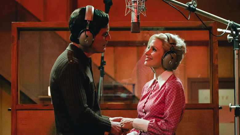 Michael Shannon and Jessica Chastain as George Jones and Tammy Wyatt, singing together in a studio in George and Tammy