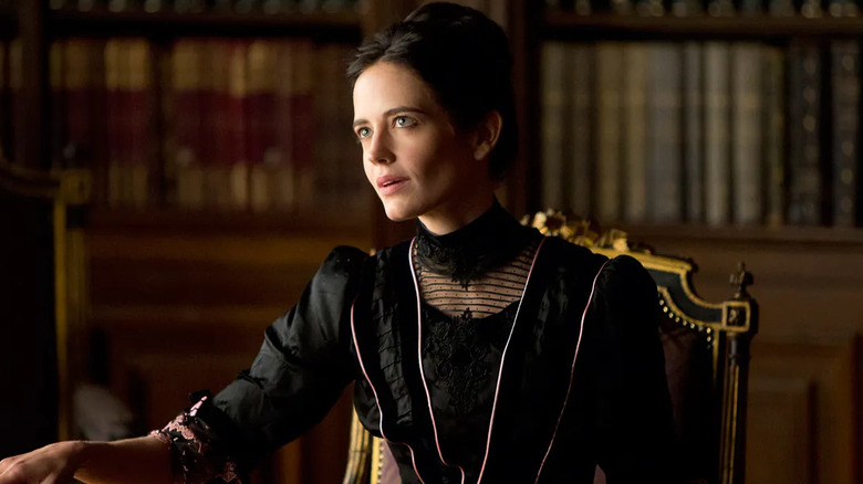 Eva Green as Vanessa Ives, sitting in a study in Penny Dreadful