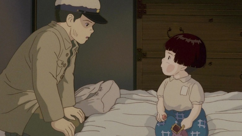 Seita and Setsuko Yokokawa sitting on a bed in Grave of the Fireflies