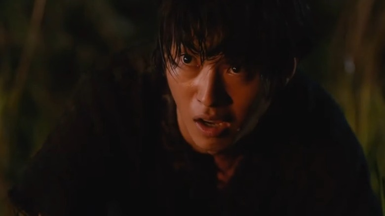 Kento Yamazaki as Li Xin with a stunned expression in Kingdom