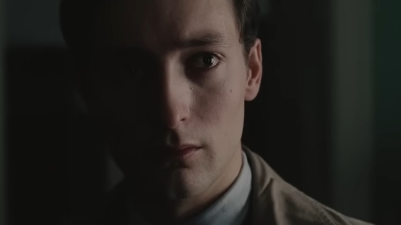 Sjur Vatne Brean as Gunnar Sønsteby with his face half engulfed in shadow in Number 24