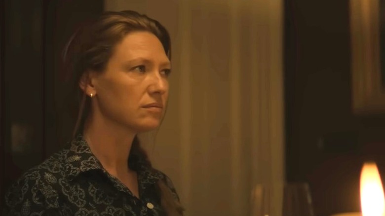 Anna Torv as Emily Lawson sitting at a table on Territory