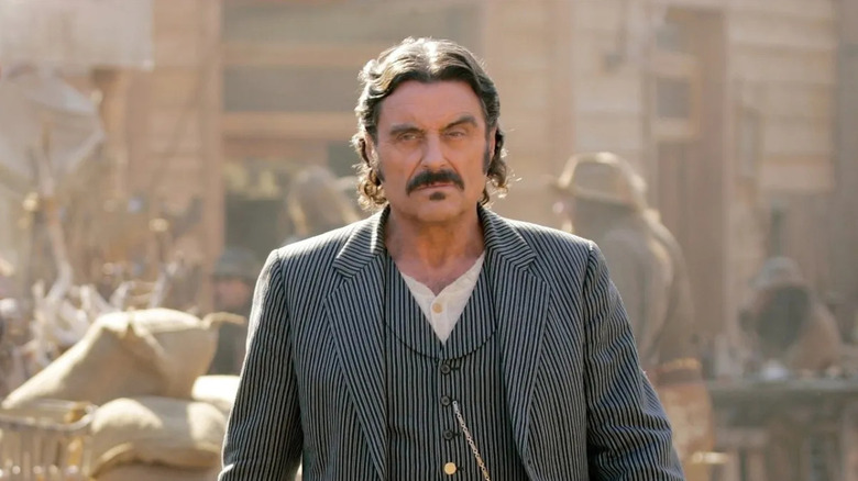 Al Swearengen (Ian McShane) walks through town in Deadwood