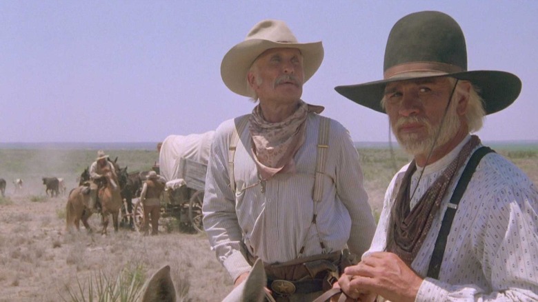 Gus McCrae (Robert Duvall) and Woodrow Call (Tommy Lee Jones) lead a wagon train in Lonesome Dove