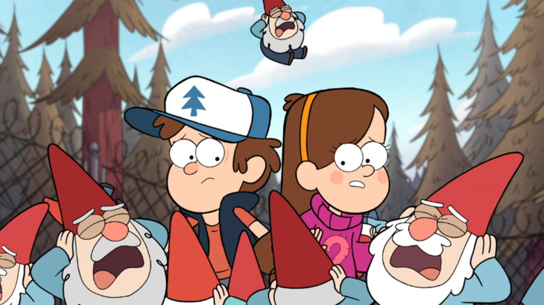 Dipper and Mabel stand in front of crying gnomes outside in Gravity Falls