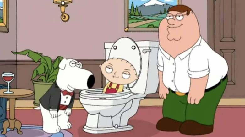 Brian and Peter surrounding Stewie in a toilet on Family Guy