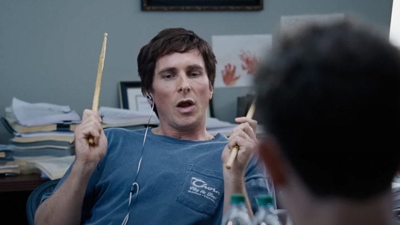 Michael Burry holding drum sticks