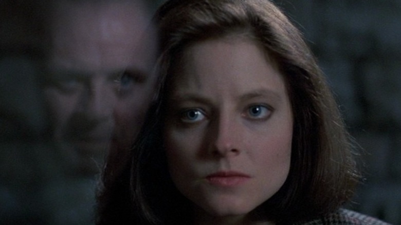 Jodie Foster looking intently at Anthony Hopkins