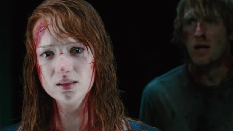 Kristen Connolly looking frightened