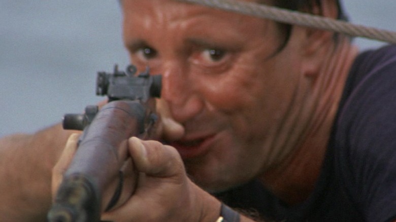 Roy Scheider with rifle