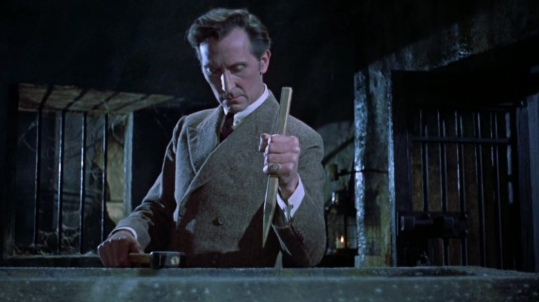 Peter Cushing with stake 