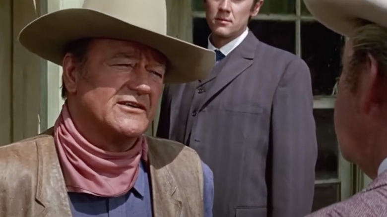 Chisum talks to some men