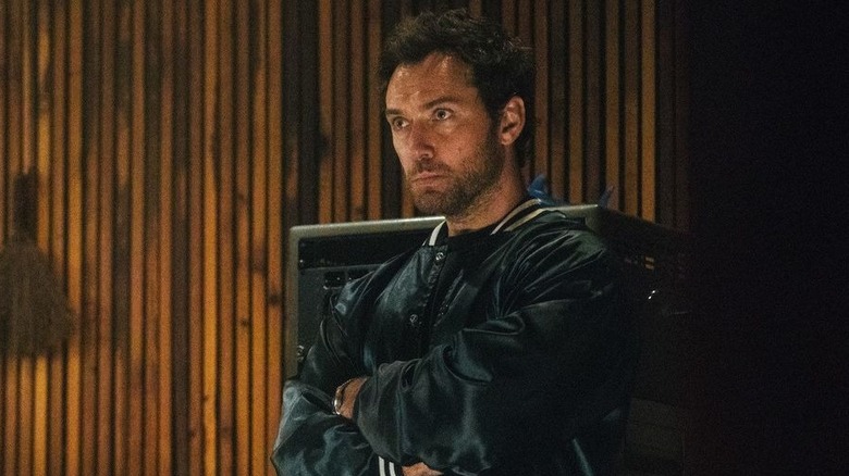 Jude Law with crossed arms