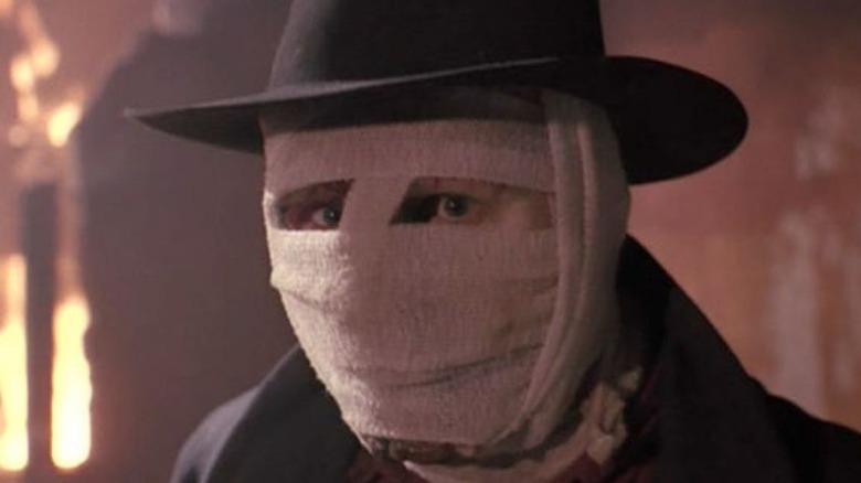Liam Neeson bandaged face