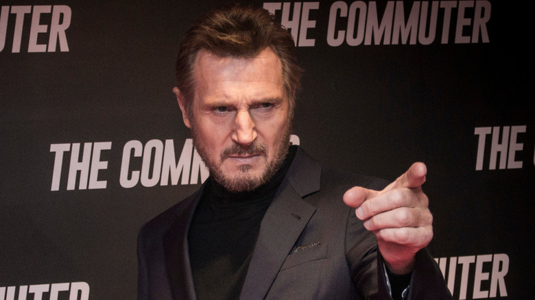 Liam Neeson pointing