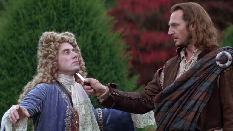 Liam Neeson holds knife to Tim Roth's throat