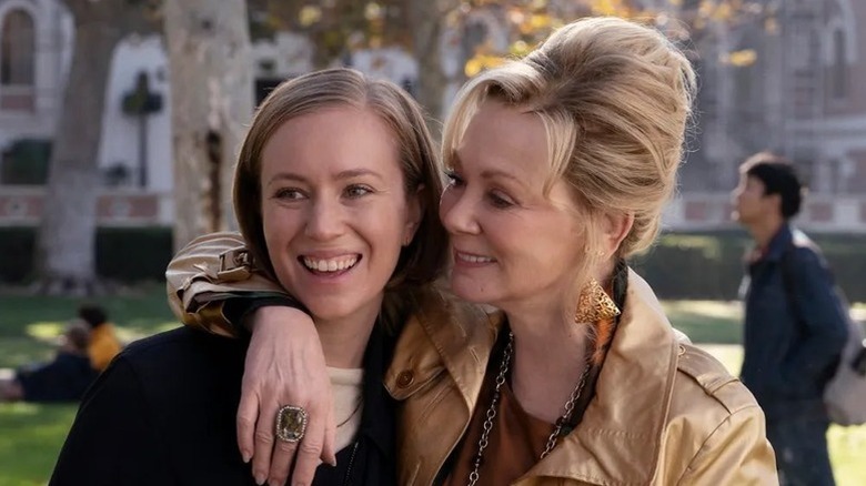 Hannah Einbinder as Ava smiling next to Jean Smart as Deborah in Hacks