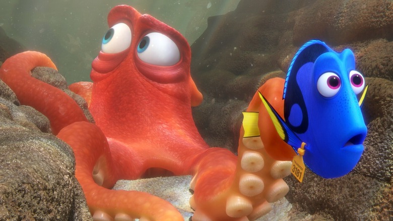 A tagged Dory (Ellen DeGeneres) swims near Hank (Ed O'Neill) as he looks up anxiously in Finding Dory