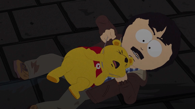 Randy strangles Winnie the Pooh, on South Park.