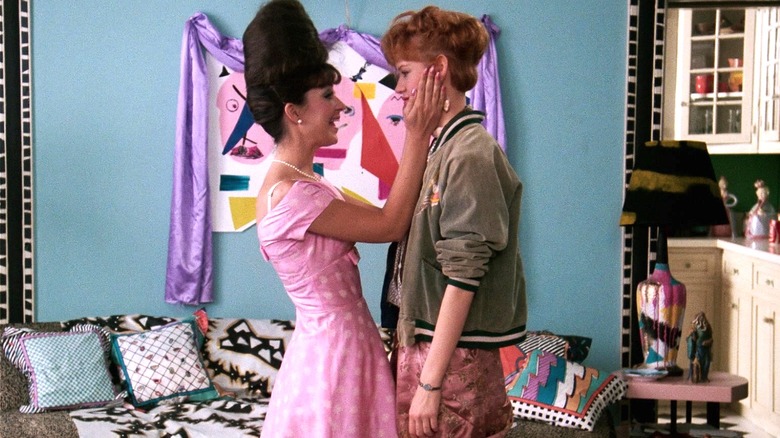 Iona (modeling pink dress) and Andie in "Pretty in Pink"