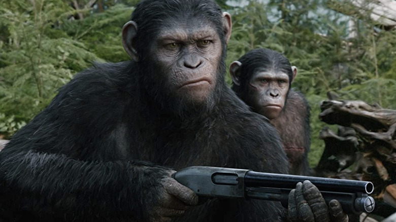 Ceasar holding a gun