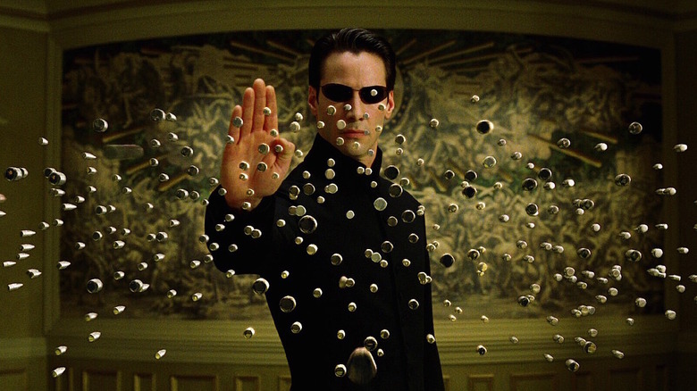 Neo stopping hundreds of bullets