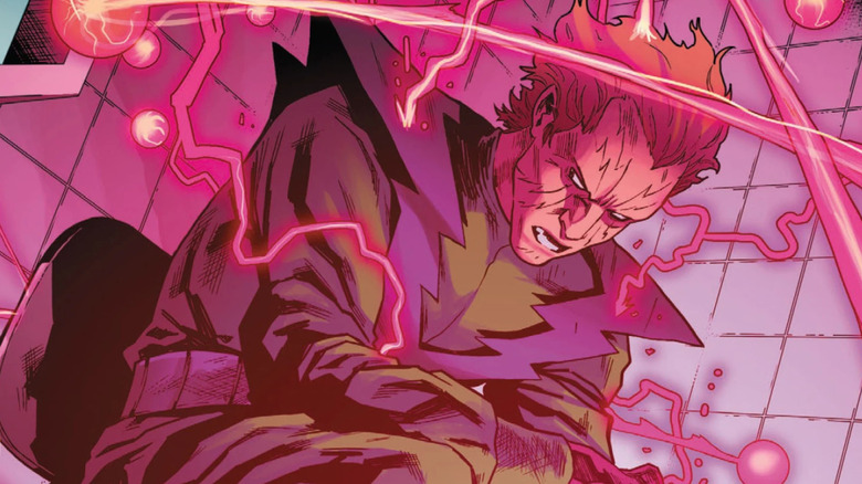 Owen Reece aka Molecule Man in a green and purple suit sitting in a chair manipulating red energy in Marvel Comics
