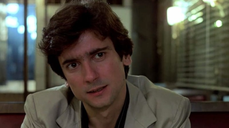 Paul Hackett (Griffin Dunne) sits intently in a diner booth in After Hours