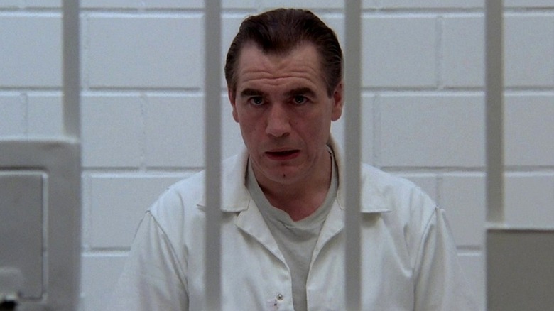 Hannibal Lecktor (Brian Cox) leers in his jail cell in Manhunter