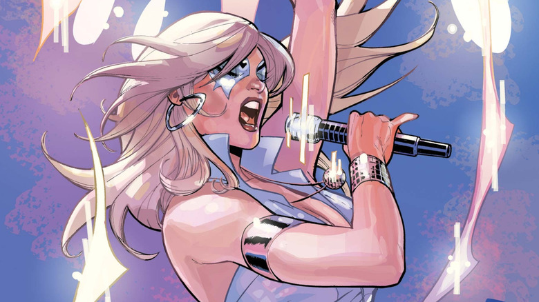 Dazzler singing and surrounded by light in a Dazzler comic cover