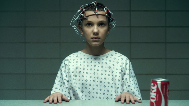 Millie Bobby Brown's Eleven connected to a device in Stranger Things