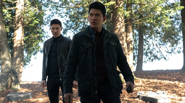 Iko Uwais' Kai Jin and Lewis Tan's Lu Xin Lee walking in Wu Assassins