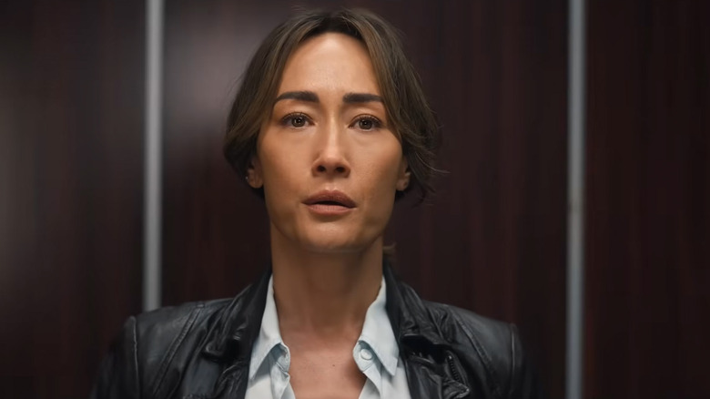 Detective Renee Ballard (Maggie Q) is shocked in an elevator in Ballard