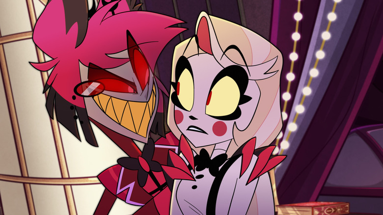 Alastor (Amir Talai) tries to tempt and intimidate Charlie Morningstar (Erika Henningsen) in Hazbin Hotel