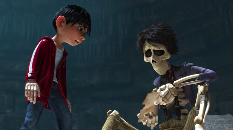Miguel comforting Héctor in Coco