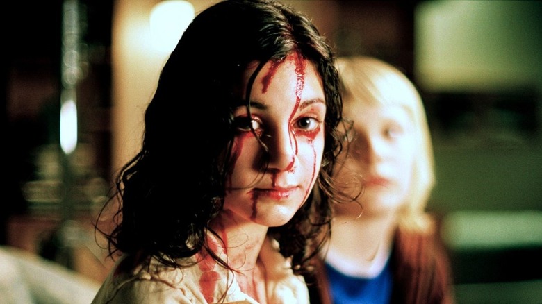 Lina Leandersson face covered in blood