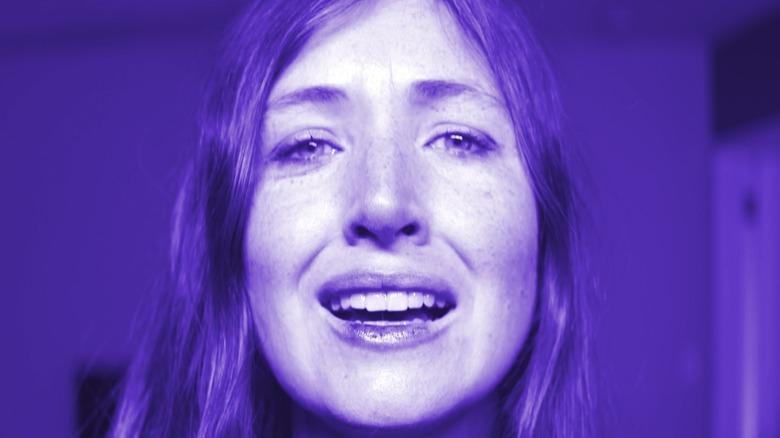 Kate Lyn Sheil smiling through filter