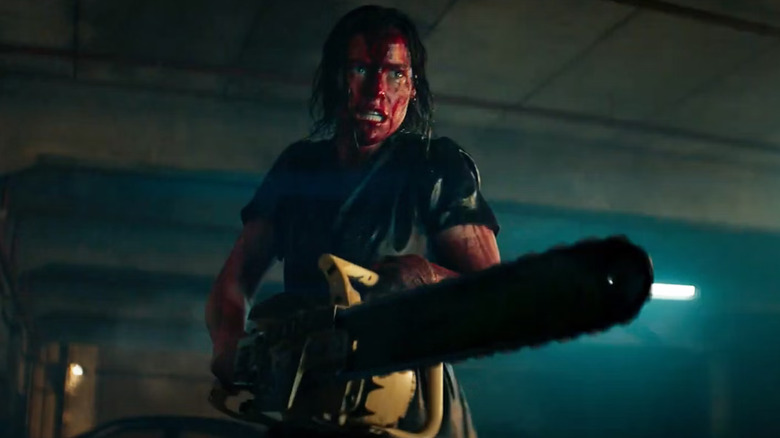 Lily Sullivan as Beth fighting evil with a chainsaw in Evil Dead Rise