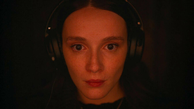 Juliette Gariepy as Kelly-Anne, watching atrocities online, in Red Rooms