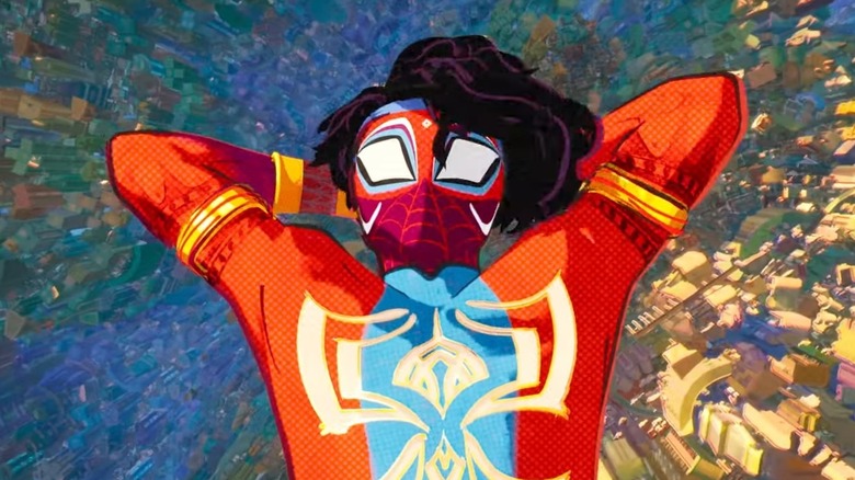 Karan Soni's Pavitr Prabhakar putting his arms behind his head in Spider-Man: Across the Spider-Verse