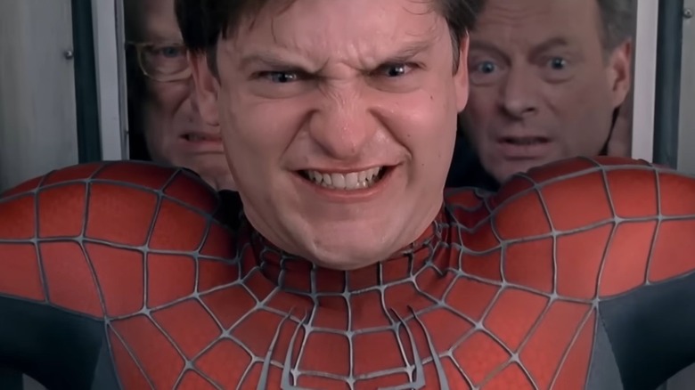 Tobey Maguire as Spider-Man grimacing in Spider-Man 2