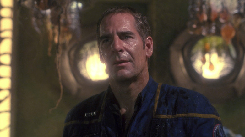 Jonathan Archer (Scott Bakula) stands covered in egg juice in Star Trek: Enterprise