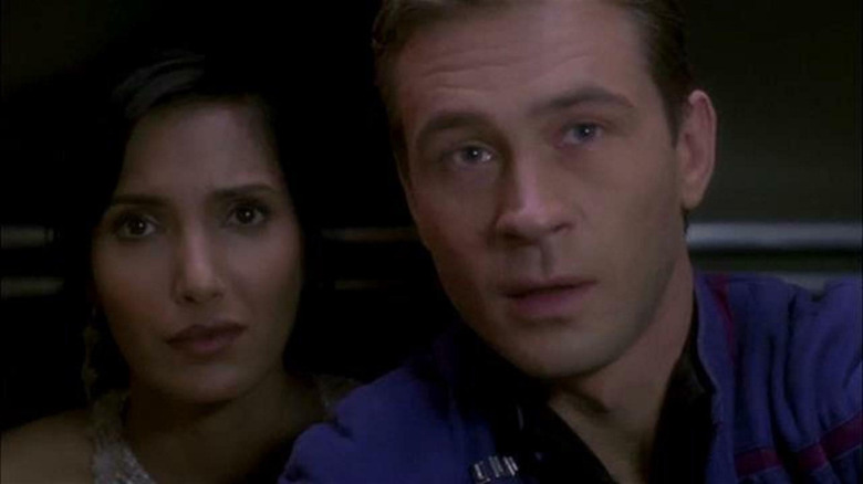 Princess Kaitaama (Padma Lakshmi) sits with Trip Tucker (Connor Trinneer) in Star Trek: Enterprise
