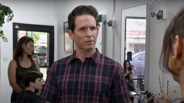 Glenn Howerton as Dennis Reynolds looking bewildered in a salon in It's Always Sunny in Philadelphia