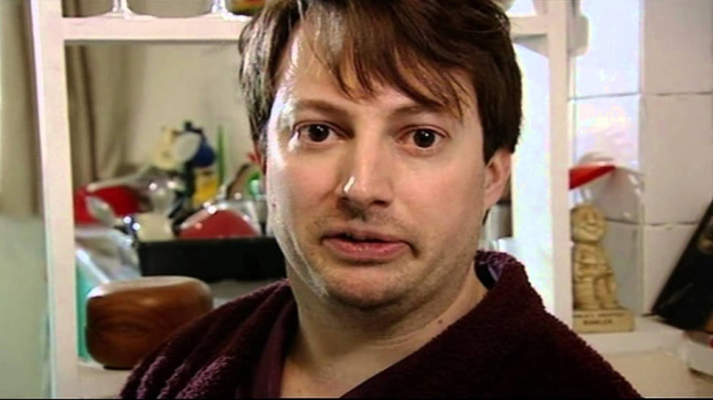 David Mitchell as Mark Corrigan staring at the camera in Peep Show