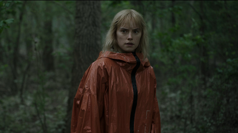Viola Eade (Daisy Ridley) is concerned in the woods in Chaos Walking