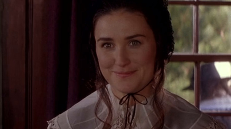 Hester Prynne (Demi Moore) smiles cheekily in The Scarlet Letter