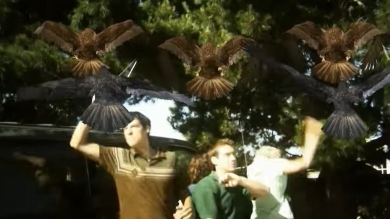 Alan Bagh as Rod, Adam Sessa as Ramsey, and Whitney Moore as Nathalie fighting off birds in Birdemic: Shock and Terror